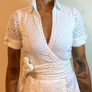 Diane Von Furstenberg white 100% cotton wrap top.